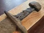 Archaeologists Pulled A Sword From Beneath The Waves Of A Lake Where It Had Lain For 1,000 Years 
